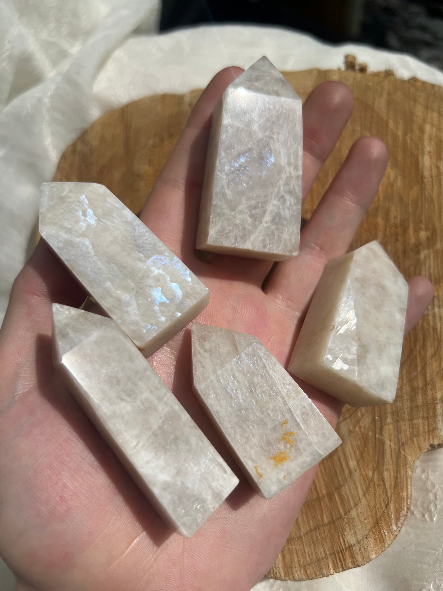 small flashy white moonstone towers