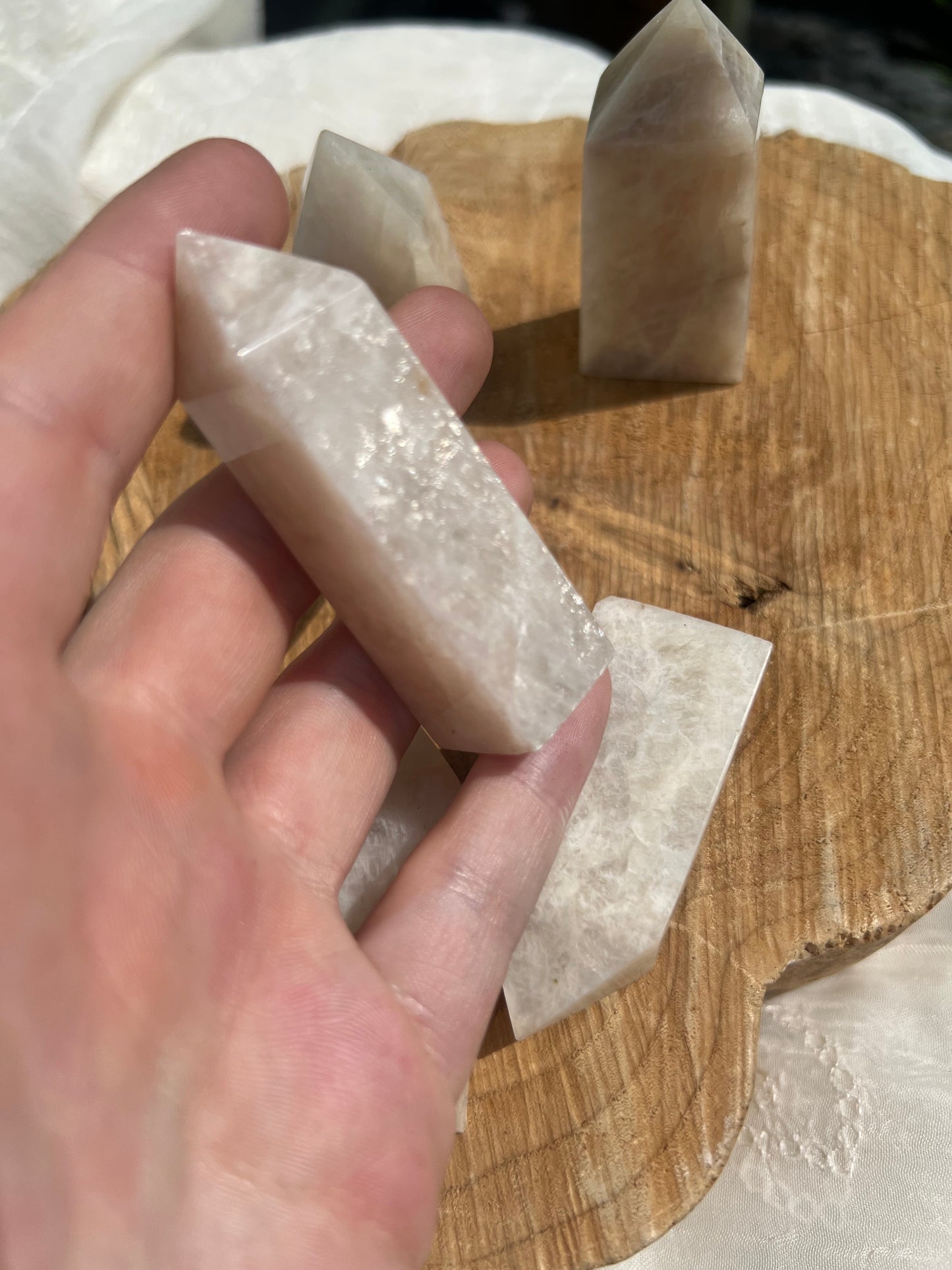 small flashy white moonstone towers