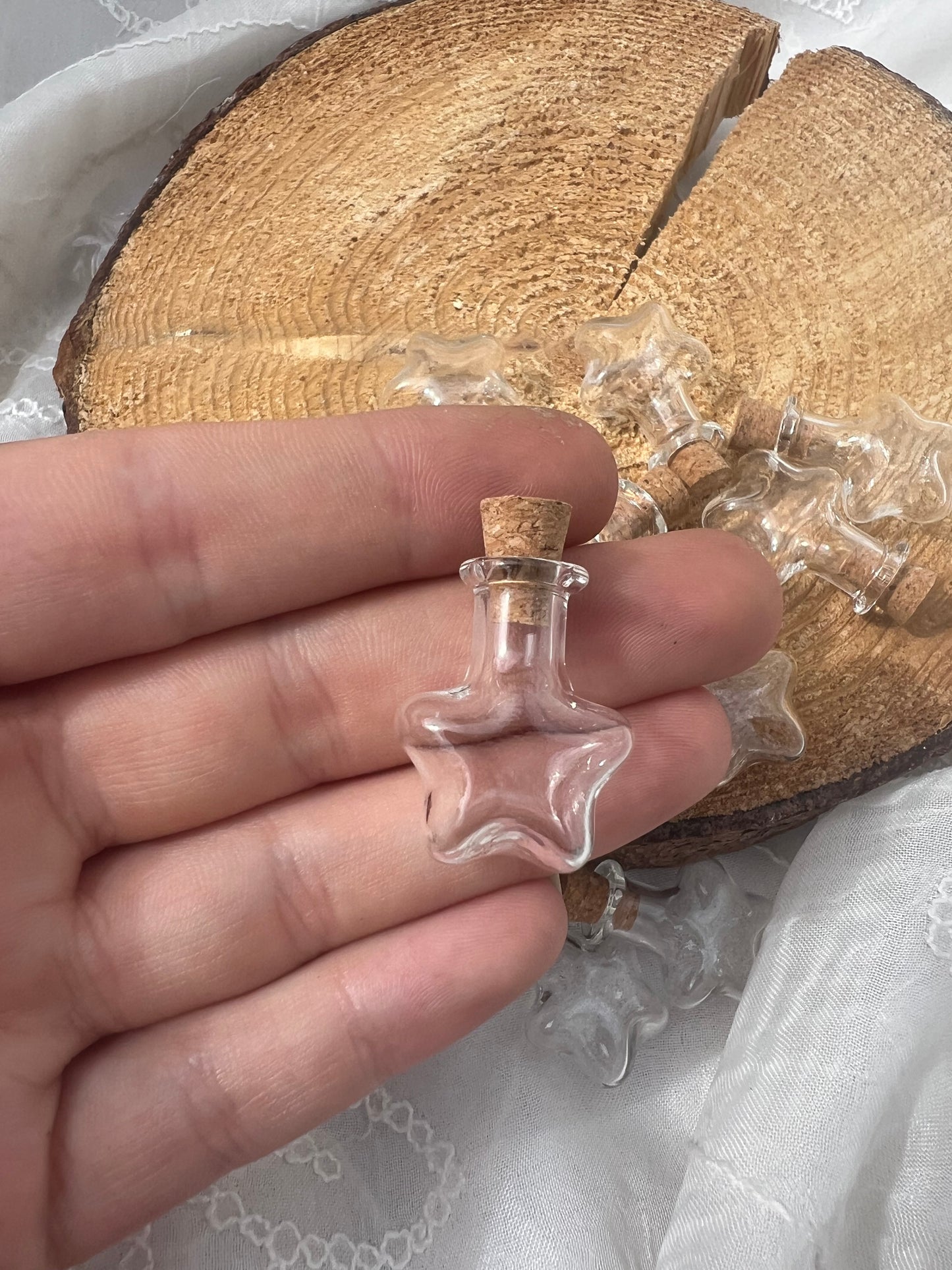 mini empty star potion bottle