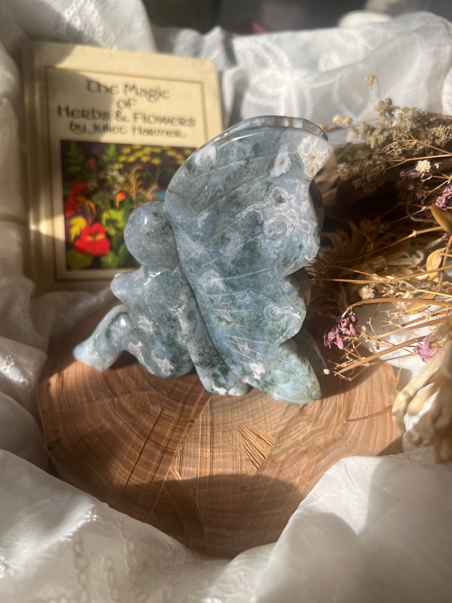 x-large moss agate sitting fairy carving