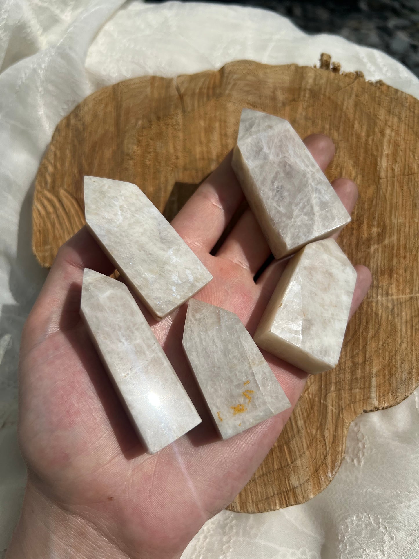 small flashy white moonstone towers