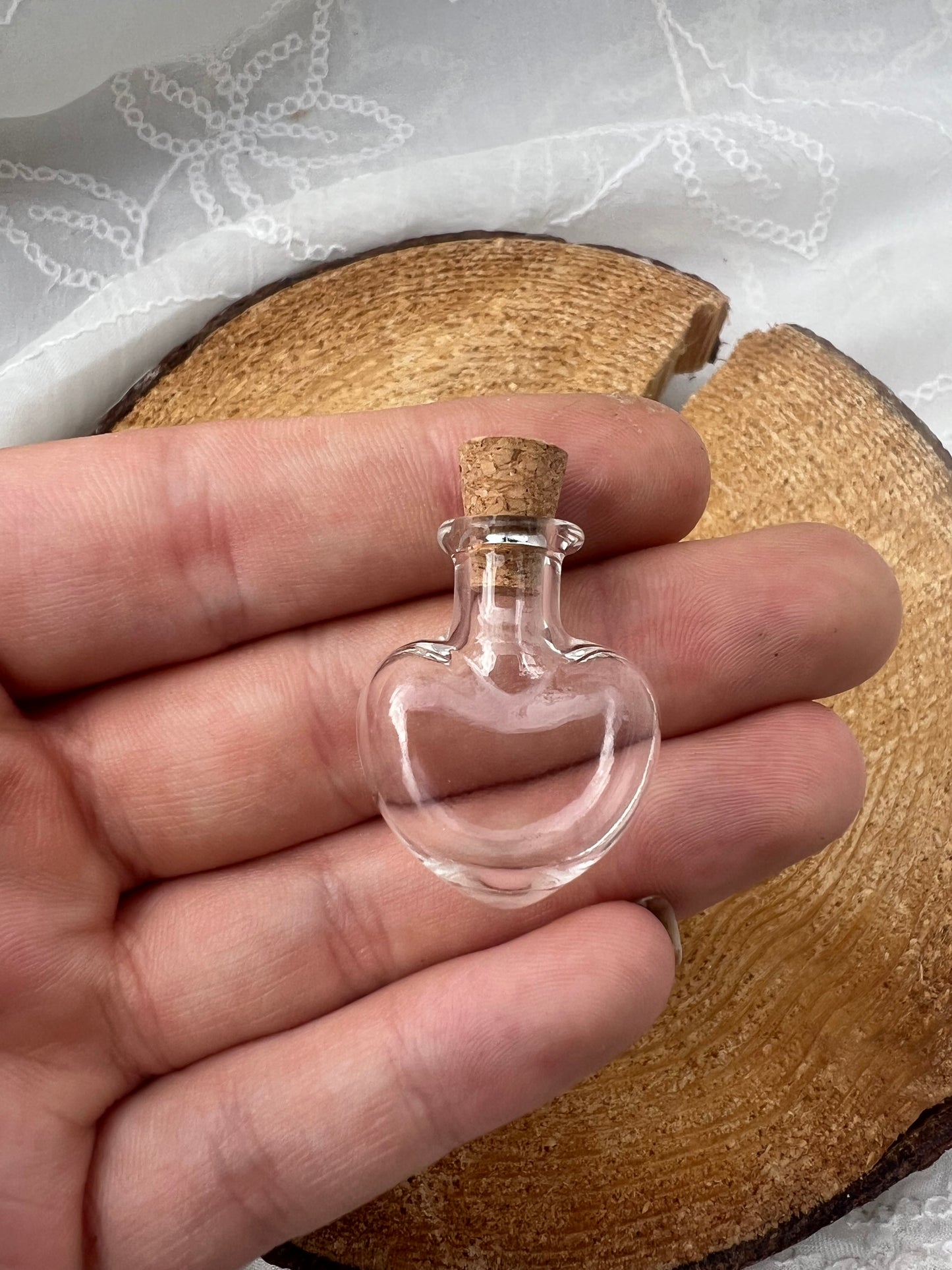 mini empty heart potion bottle