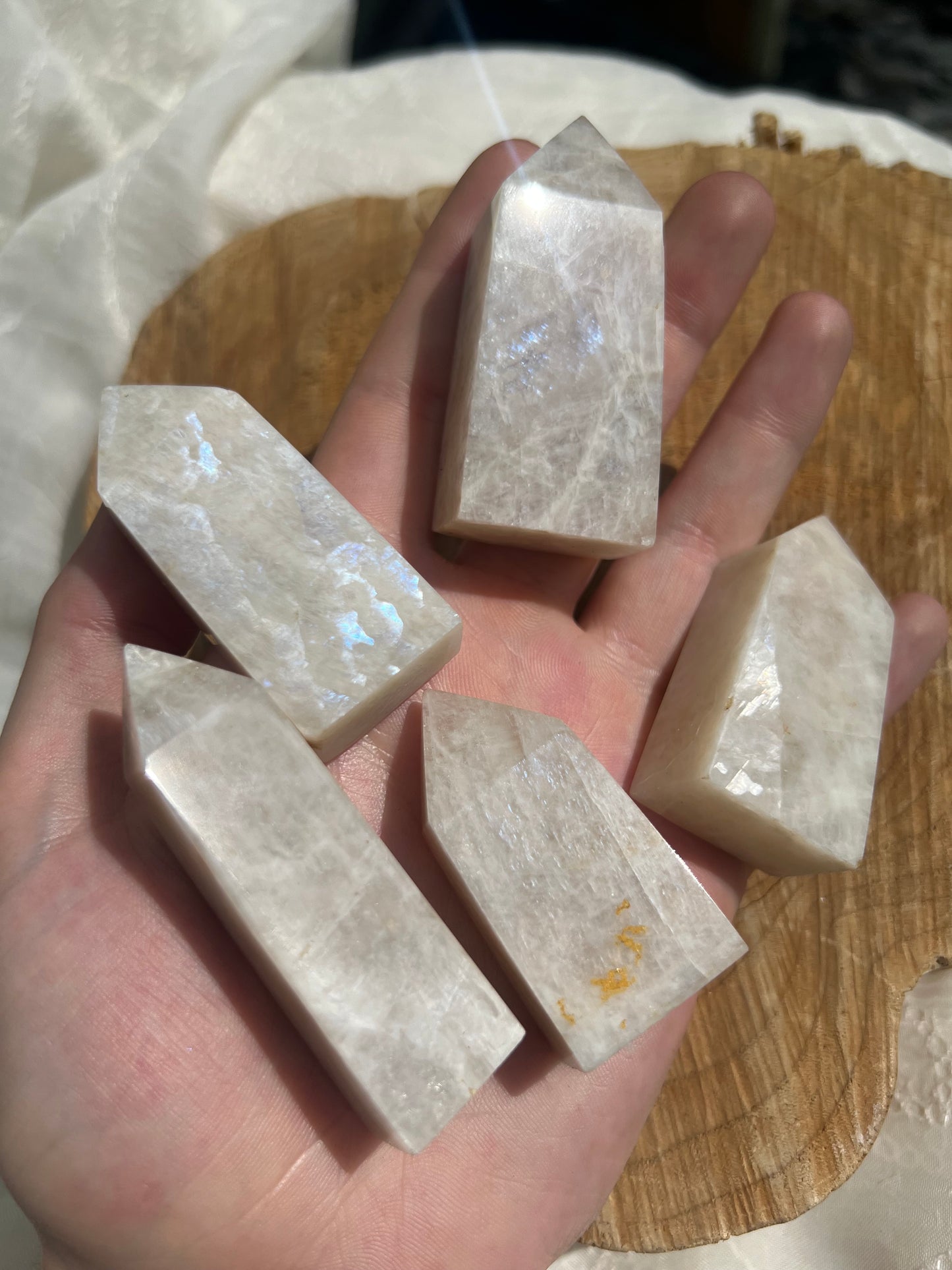 small flashy white moonstone towers