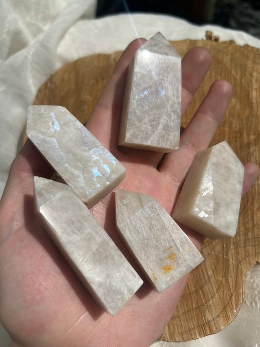 small flashy white moonstone towers