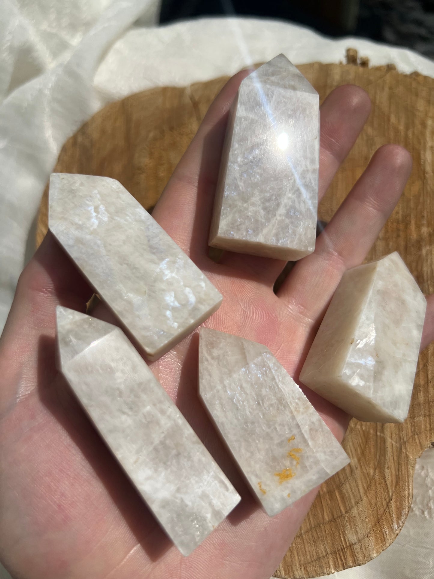 small flashy white moonstone towers