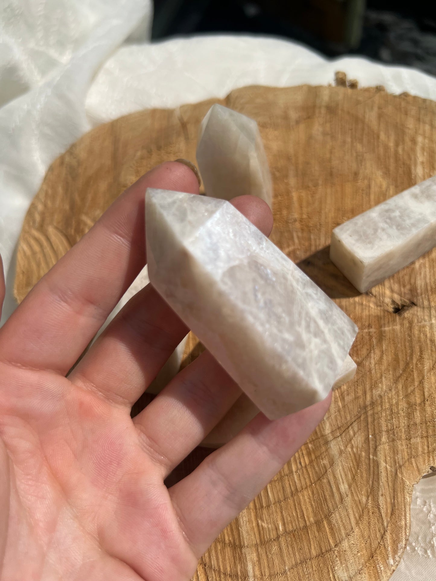 small flashy white moonstone towers